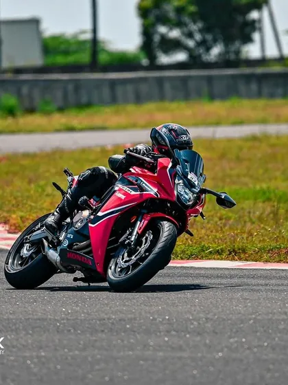 Magic lives in curves. A rider on a Honda CBR demonstrates smooth and confident cornering during an open session with us.