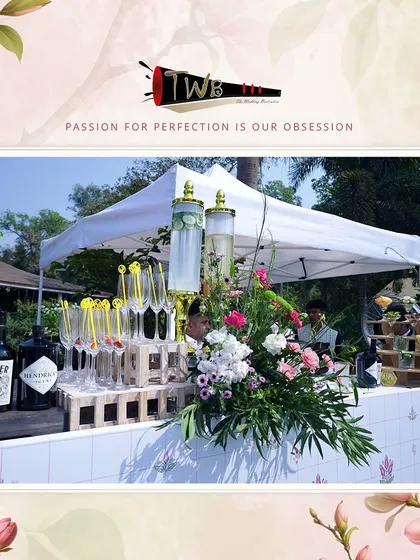 A stylish Gin & Tonic bar setup, complete with premium gins and a variety of garnishes for guests to customize their drinks.