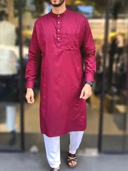 A clean, tailored look featuring a maroon long kurta with a shirt collar, paired with white pajamas. I can customize details like collars and pockets.