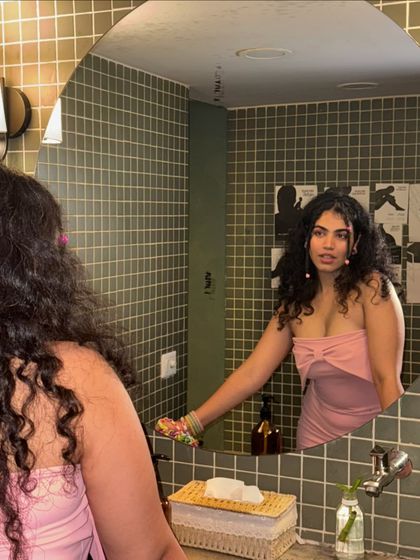 A mirror selfie from my birthday trip. This pink dress is simple but the color makes a statement. It's a great example of how a single bold color can be just as impactful as a print.