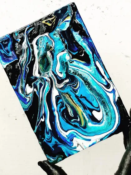 A beautiful example of a fluid art piece created in one of my workshops. Participants learn four different pouring techniques to create their own abstract masterpiece to take home.