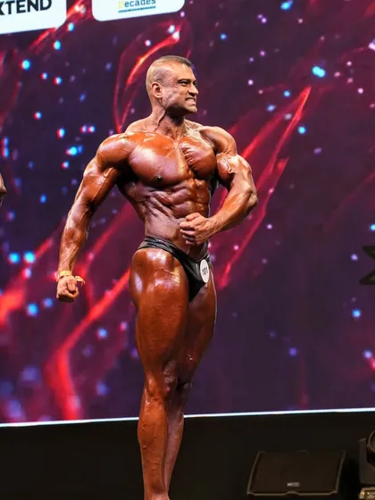 The side triceps pose. While not always a mandatory pose in every category, it's a powerful shot to have in your arsenal to display arm size and conditioning.