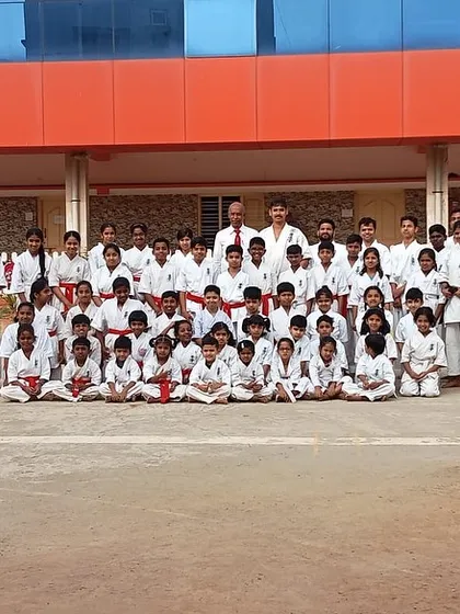 A large group photo from our main dojo's belt grading exam. It is a proud day for students of all ranks, from red belts to black belts.