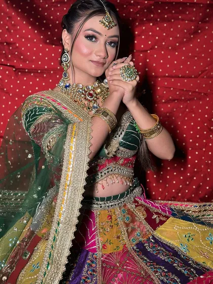This multi-color lehenga with a green blouse is a festive and joyful option. It's perfect for Mehendi or Sangeet photoshoots where vibrant colors are key.