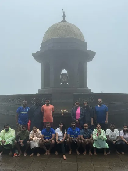 A group photo at the historic Raigad Fort, the capital of Chhatrapati Shivaji Maharaj, shrouded in monsoon mist.