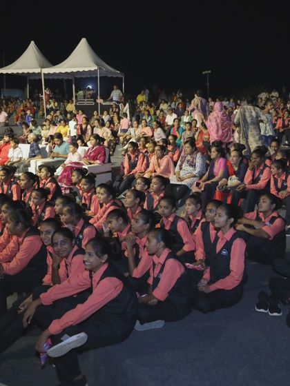 A captivated audience watches our performance at the Meera Mahotsav in Gujarat. Our shows are designed to engage viewers of all ages, from young students to seasoned art lovers.