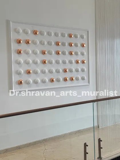 This is the final look of a modern relief mural we installed by a staircase. The clean lines and the contrast between matte white and metallic copper create a sophisticated and minimalist aesthetic that enhances the home's contemporary design.