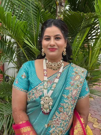 A portrait showing the stunning traditional jewellery paired with a soft glam makeup look.