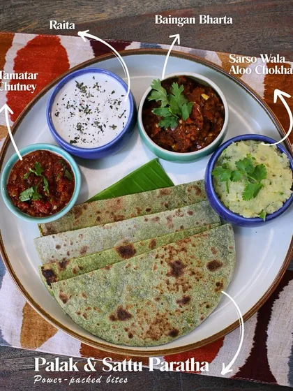 This is a taste of my home. Our Bihari Babu thali features smoky baingan bharta, mustard-kissed aloo chokha, and soft palak and sattu parathas. These are the flavors I grew up with, rooted in tradition and crafted with love to bring the authentic culture of Bihar to your plate.