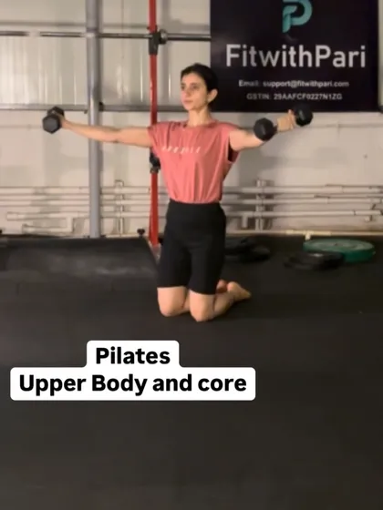 An image from our upper body and core Pilates session. This kneeling lateral raise with light dumbbells helps sculpt the shoulders while engaging the core to maintain a stable posture.