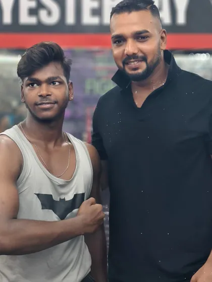 Posing with a student. It's rewarding to see my clients get stronger and more confident.