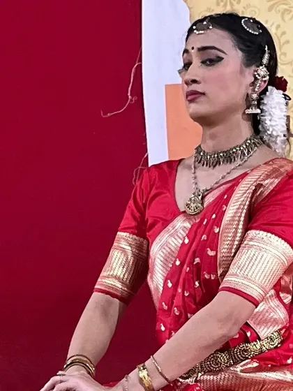 A performance still from the same event in Goa. The regal posture and intense expression are part of a lecture demonstration, explaining the nuances of the art form.
