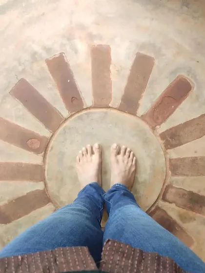 Grounding oneself is a vital part of the creative process. The floor of this home features a sunburst pattern made of brick inlay, a small, tactile detail that connects the inhabitant to the earth with every step.