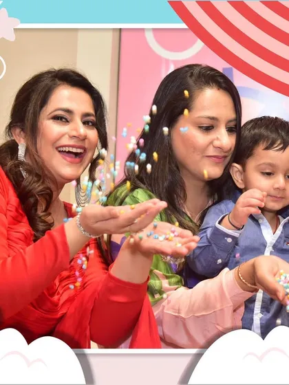 For the most fun birthday parties ever! This photo captures the pure joy and excitement of a celebration, with colorful candies flying through the air.