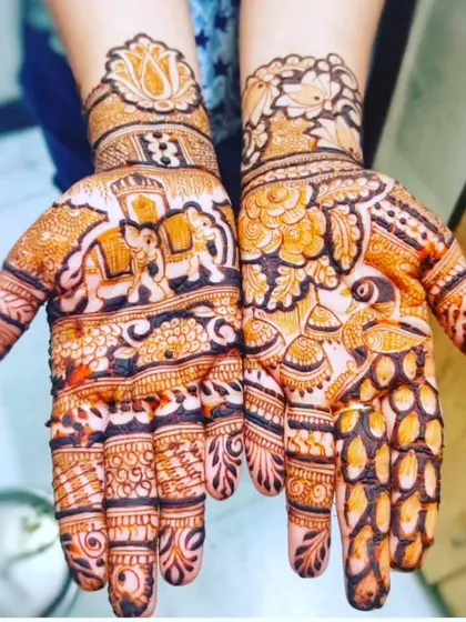 A playful design featuring a procession of elephants on one hand and a peacock on the other. This style is perfect for capturing a festive and celebratory mood.