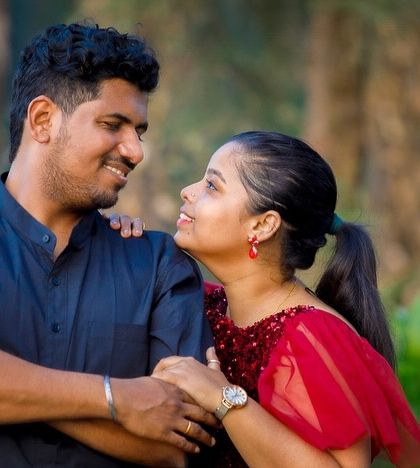 A candid moment from a pre-wedding shoot. The client is wearing our red flutter-sleeve top, which can be paired with a skirt or gown for a customized rental look.