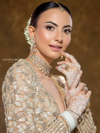 A stunning close-up from the airbrush demo. The white henna and flawless makeup create a unique and memorable bridal look for your portfolio.
