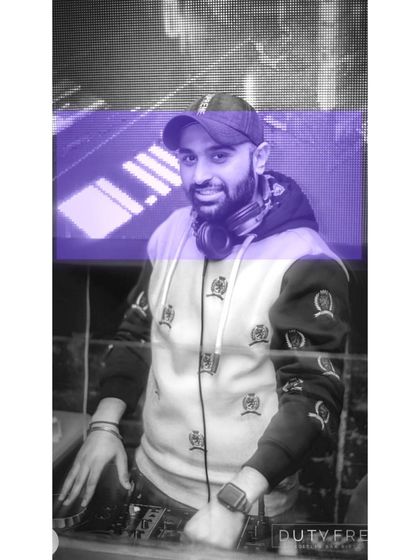 A stylized black and white photo from a set at Duty Free. I'm in my own world when I'm performing, completely focused on the music.