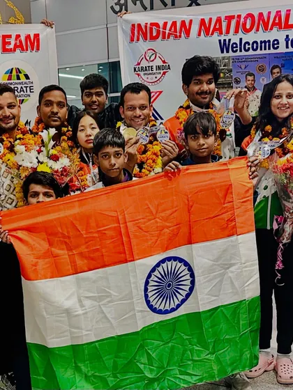 A hero's welcome for our Commonwealth Championship medalists. The Indian flag is a constant reminder of who we fight for.
