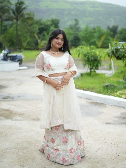 The flowy skirt of this white lehenga makes it a dream to wear and photograph.