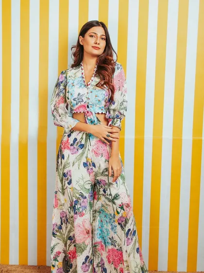 A full-length shot of the second model in the same collection, showing consistency in the brand's look.