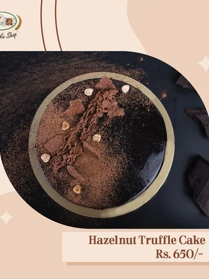 Our Hazelnut Truffle Cake is pure indulgence. A rich chocolate cake with a silky hazelnut truffle frosting, it's a guaranteed crowd-pleaser for any celebration.