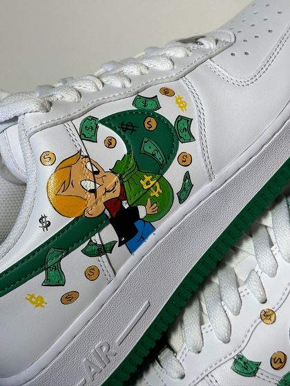 A macro shot of the Richie Rich artwork on the custom AF1s.