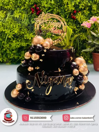 For those who like modern and stylish designs, I make cakes like this two-tier black and gold one. It's perfect for a fancy birthday party or any elegant celebration.
