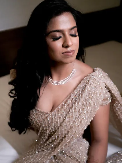 A close-up of the reception makeup, showing the beautiful shimmer and flawless skin.