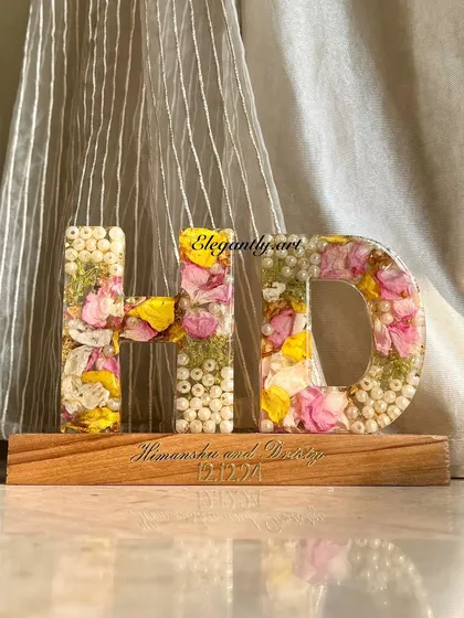Your memories, your initials, forever illuminated. This custom "HD" monogram LED lamp turns precious blooms from a wedding garland into a stunning keepsake that lights up your home and heart.