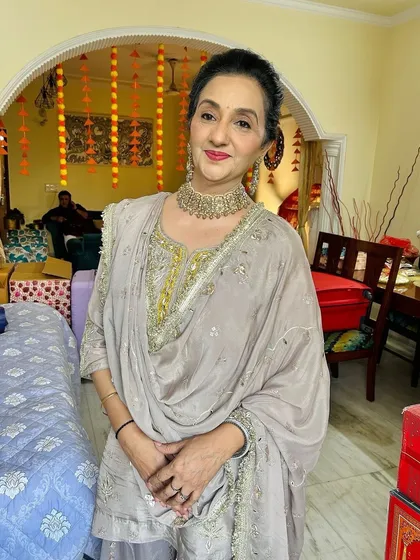 It's a joy to work with clients of all ages. For this mature skin makeup, I focused on creating a hydrated, lifted look with soft definition on the eyes and a flattering lip color, ensuring she felt elegant and confident.