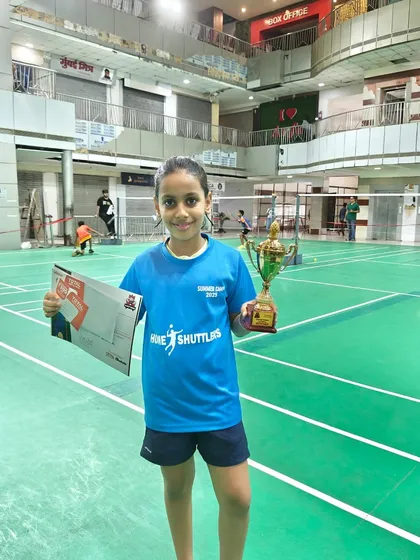 We are incredibly proud of our young champions. Here is one of our U11 winners from the end-of-camp tournament, showcasing the results of dedicated practice and expert coaching.
