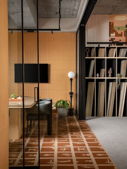 The meeting space at Trove, blending functionality with a strong visual identity. The graphic tile floor and organized material sample storage make it an inviting and practical space for design discussions.