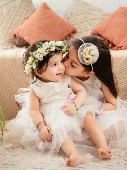 There's nothing like the love between siblings. We create a fun atmosphere to capture their genuine connection and playful energy, creating memories that will last a lifetime.