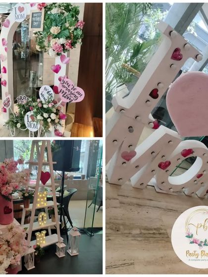 More details from our Mother's Day event decor, including a welcome arch and a decorative ladder with personalized signs.