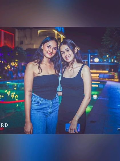 Two friends enjoying the evening by the pool. My sets here are perfect for a sophisticated yet fun night out.