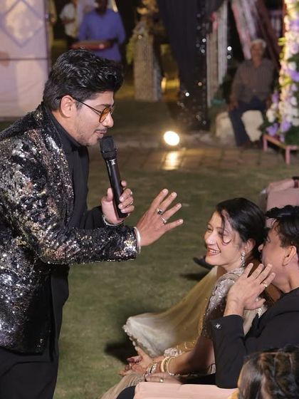 Interacting with the guests sitting in the front row. I make sure to connect with everyone, making them feel like they are a part of the show.