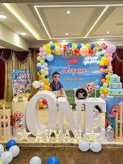 A classic Cocomelon theme that is always a hit with the kids. This party features a colorful balloon arch, character cutouts of JJ and his friends, a large 'ONE' sign, and a personalized backdrop, creating a fun and familiar world for the little ones.