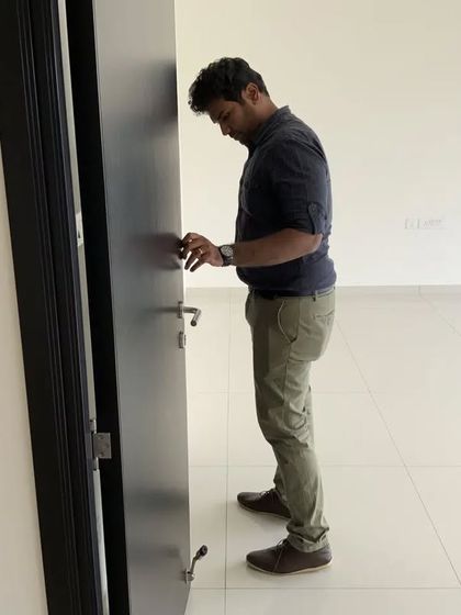 A close inspection of door handles and locks. No detail is too small when it comes to ensuring quality for our clients.