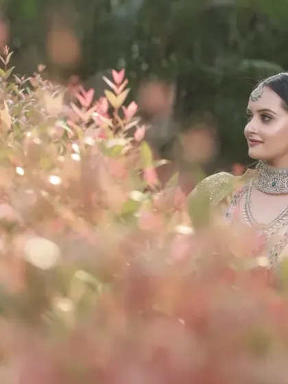 A collection of portraits featuring a model in a golden-hued traditional outfit, shot outdoors. The natural light and garden setting add a soft, ethereal quality to these elegant images.