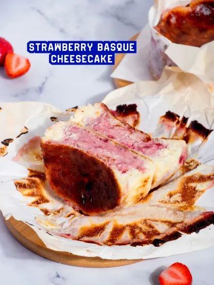 Our Strawberry Basque Cheesecake has that signature burnt top and a creamy, gooey center, with a swirl of fresh strawberry for a fruity twist.