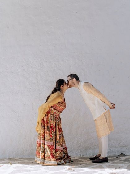 A collection of portraits from a beautiful Haldi photoshoot. I coordinate with the photo team to capture a variety of shots, from romantic close-ups and playful kisses to stylish individual portraits, all within a cohesive, sun-drenched theme.