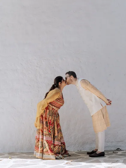 A collection of portraits from a beautiful Haldi photoshoot. I coordinate with the photo team to capture a variety of shots, from romantic close-ups and playful kisses to stylish individual portraits, all within a cohesive, sun-drenched theme.