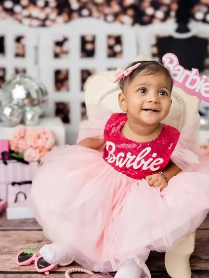 This little Barbie is the star of the show. Sibling sessions can also include beautiful individual portraits.