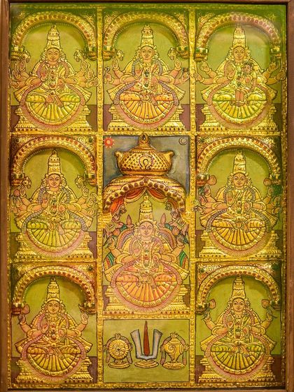 The magnificent Tanjore 'Ashtalakshmi,' capturing the eight manifestations of Goddess Lakshmi. Each form symbolizes a unique aspect of prosperity, from wealth and knowledge to courage and victory, rendered in light green hues and intricate detail.