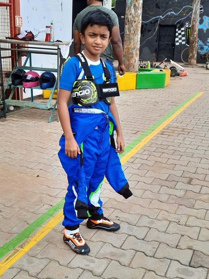 A young driver ready for his session.