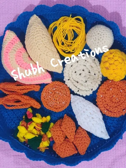 Celebrating traditions with a twist, this is my crochet "Diwali cha faral," a full platter of handmade yarn sweets and savories, perfect for unique festive decor.