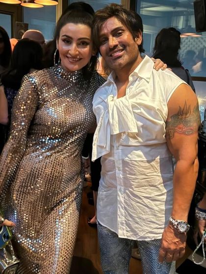 Rocking the Saturday night look, our client Mr. Birla shines in our custom bling jeans, perfect for making a statement on the dance floor.