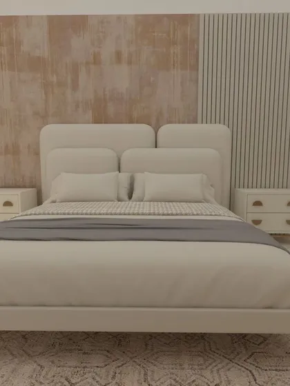 A full view of the master bedroom design for Cleo County, showing the upholstered bed against the textured accent wall. The bedside tables are simple and modern, keeping the focus on the beautiful wall treatment.