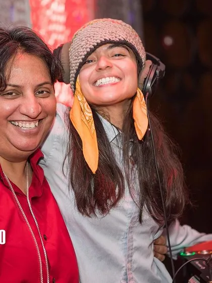 A moment of connection between me and guest DJ Offering Rain. I love collaborating with other talented artists to bring fresh sounds to the Bollywood Disco stage.